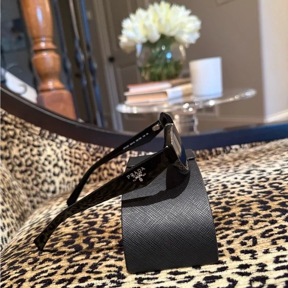 Prada Sleek Black Oval Sunglasses - Picture 4 of 4